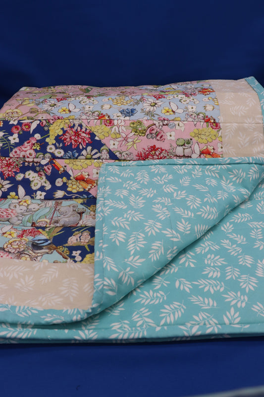 Baby gum nut cot quilt